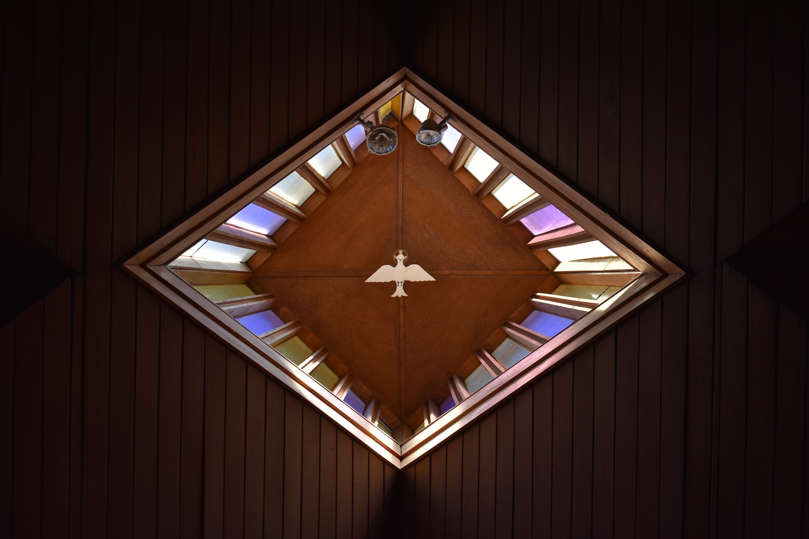 triangular brown and purple decor with dove bird art