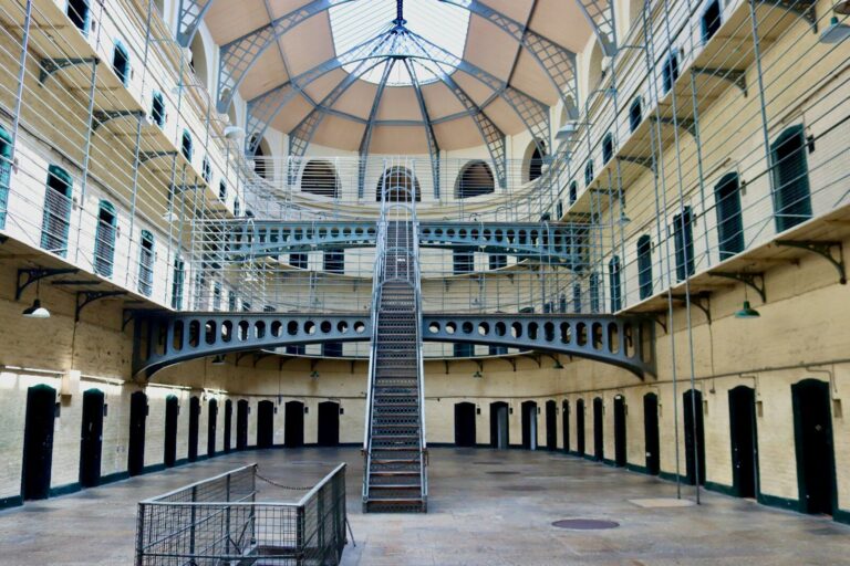 The inside of a building with stairs and a skylight